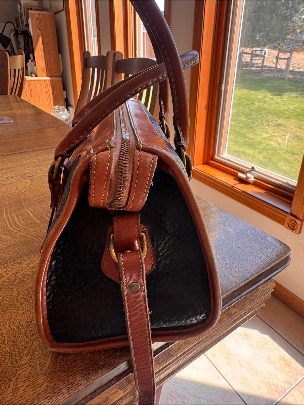 Dooney & Bourke Black and Brown Pebbled Leather Satchel